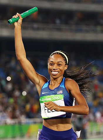 Photos Allyson Felix [États-Unis] après avoir remporté l'or lors du relais 4x400 mètres femmes aux Jeux Olympiques, photographie de Ezra Shaw, 2016.
