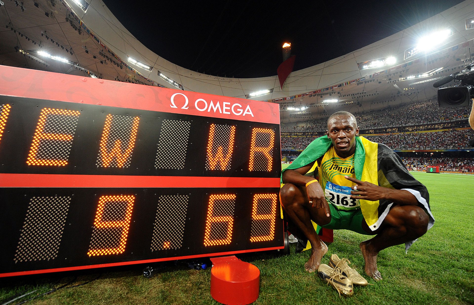 Photos Usain Bolt [Jamaïque], son temps record au 100 mètres, photographie d’Alain Mounic, 2008.
